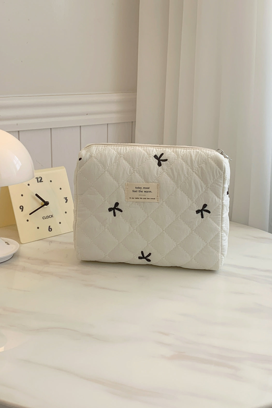 Bow Embroidered Quilted Storage Bag - The Daily Makeover
