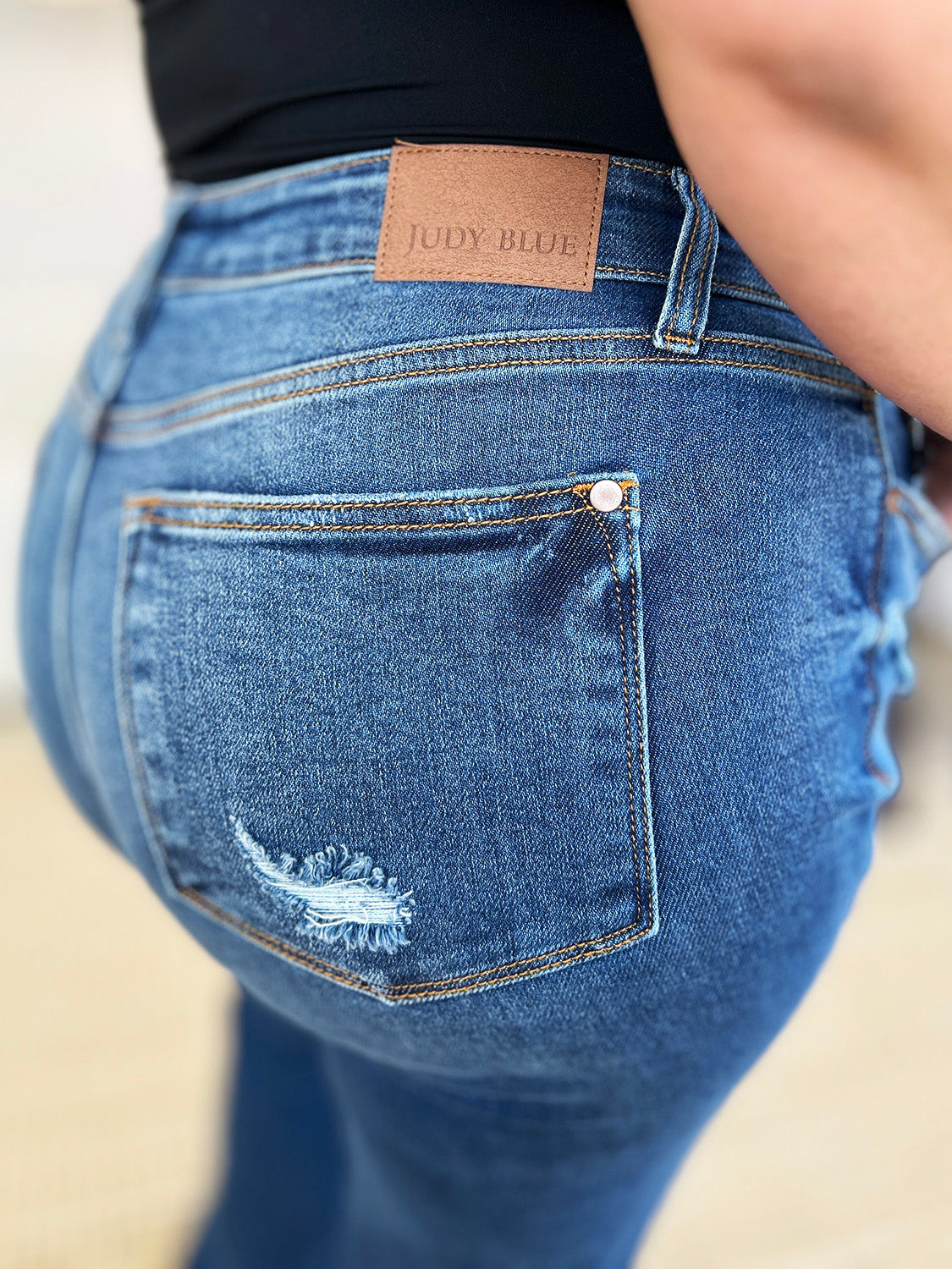 Judy Blue Full Size Mid Rise Distressed Raw Hem Jeans - The Daily Makeover