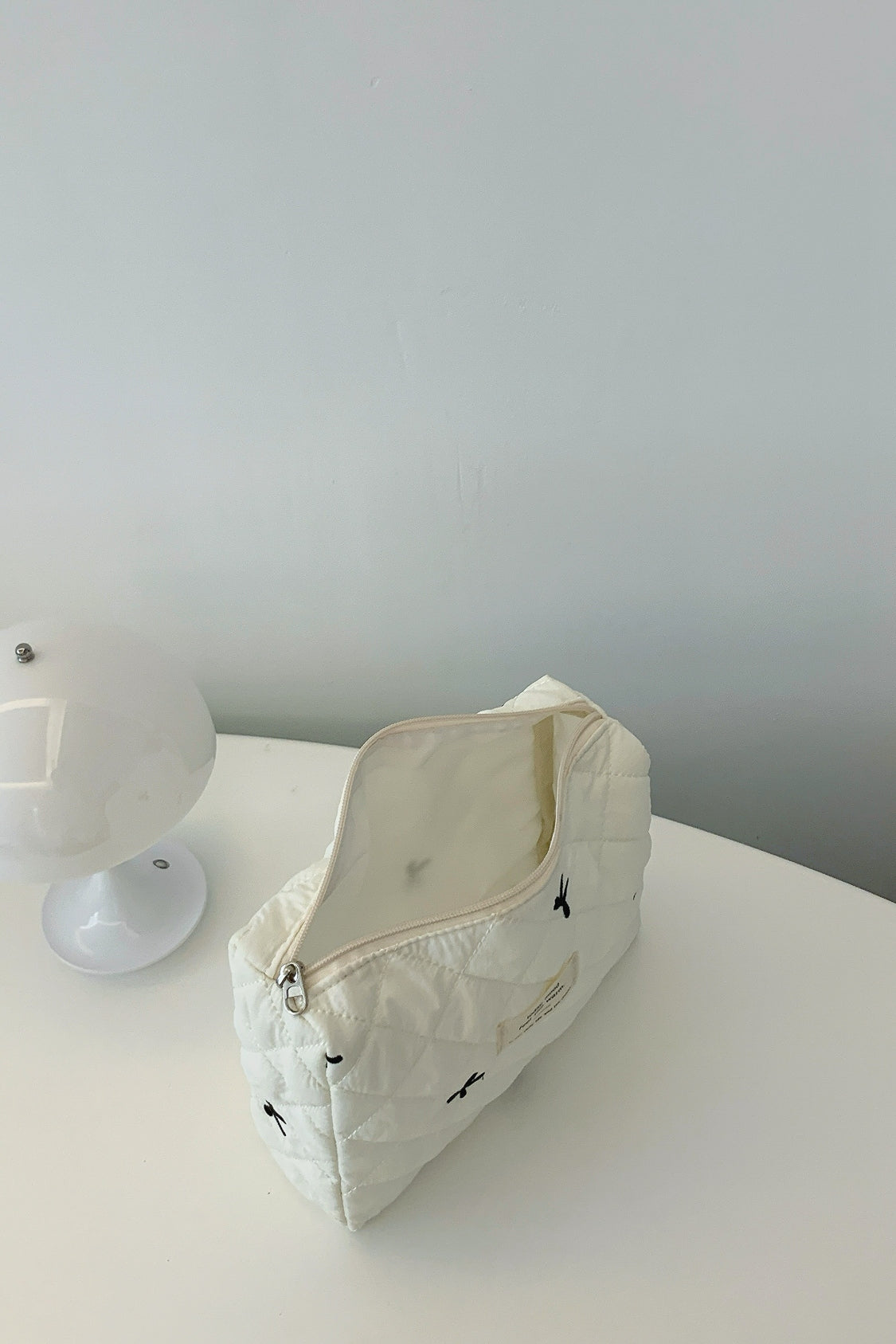 Bow Embroidered Quilted Storage Bag - The Daily Makeover
