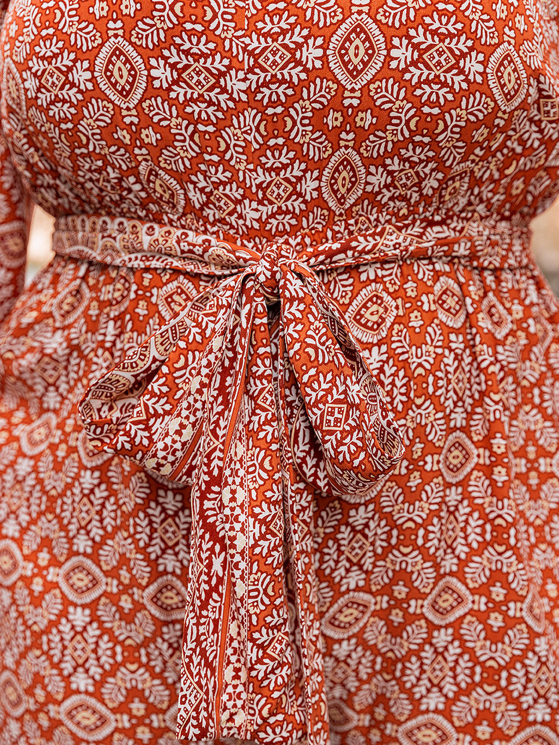 Plus Size Printed V-Neck Tie Front Balloon Sleeve Jumpsuit - The Daily Makeover